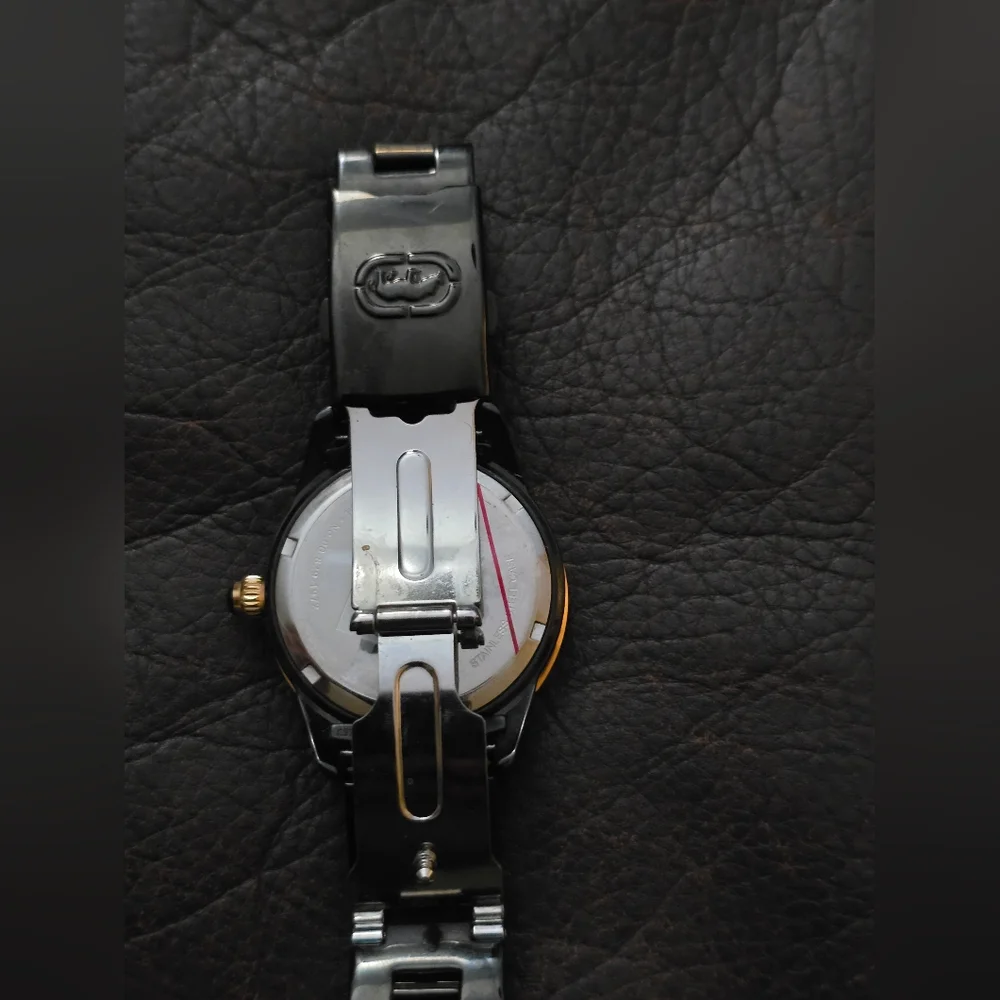 Marc Ecko womens E17536L1 black and gold‎ with gem accents. Stainless steel